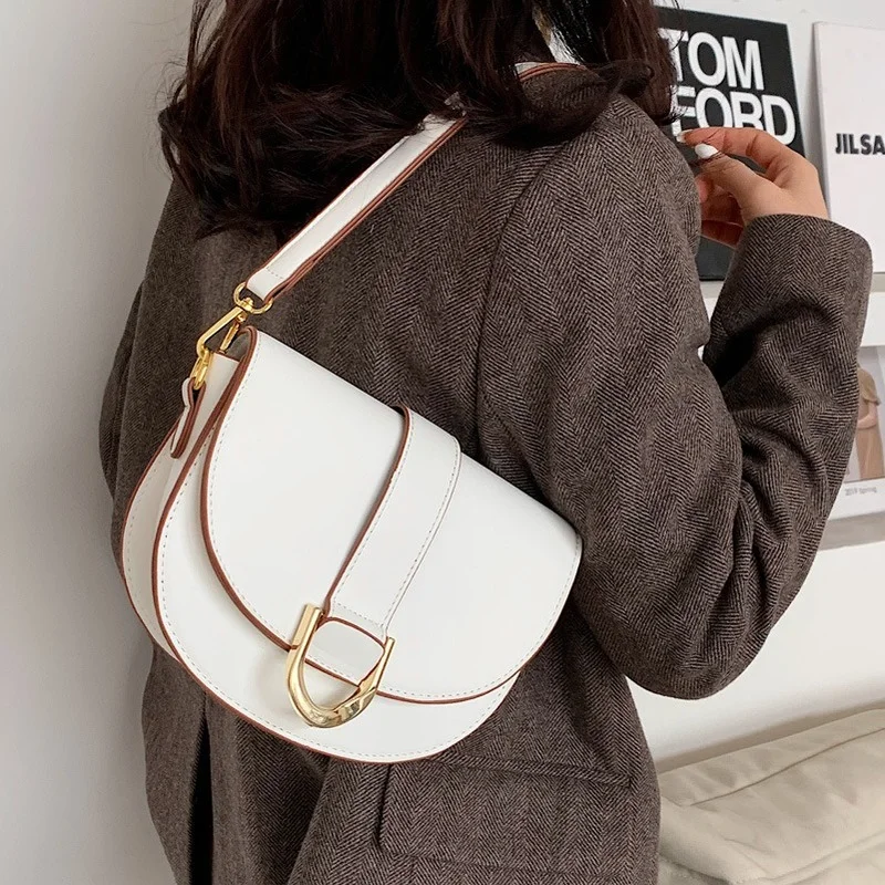 

Hot Selling Women's Bag 2023 New Fashion Western Style Messenger Bag High Quality Simple Metal Buckle Saddle Bag