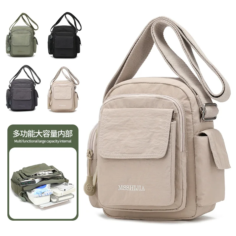 

New Simple Camera Bag Fashion Versatile Niche Women's Bag Outdoor Single Shoulder Crossbody Men's Nylon Waterproof Bag
