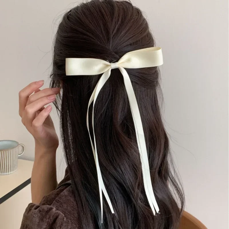 Nowa kolorowa satynowa wstążka Bowknot spinki do włosów niezbędne dla dziewczyny plecione kokardy do włosów moda długie frędzle damskie akcesoria Barrettes