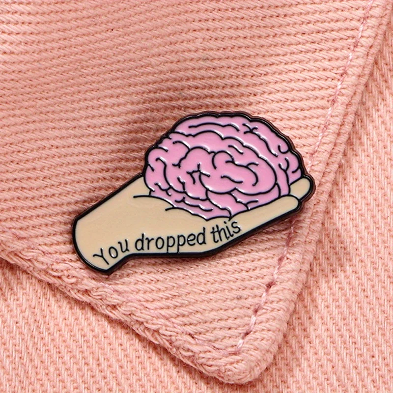 

"You Dropped This" Funny Hand Holding Brain Quirky Brooch Waist Tightening Needle Bag Hat Badge Accessories