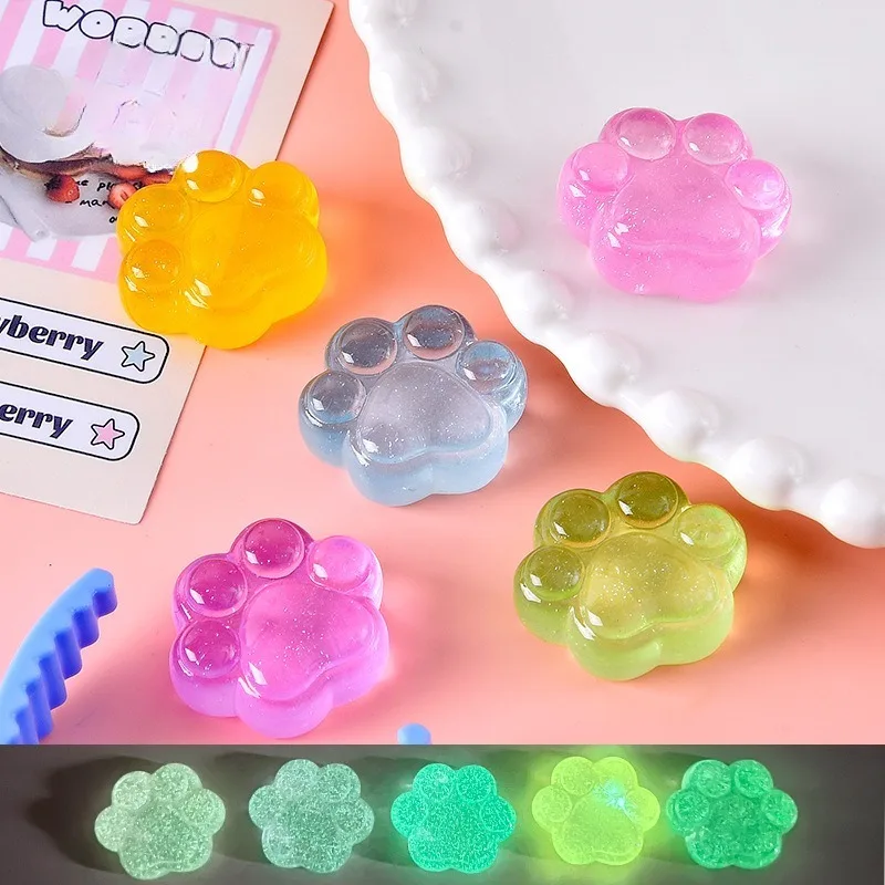 

Luminous glitter cat claw resin accessories children's handmade diy mobile phone shell pendant, cream glue material.