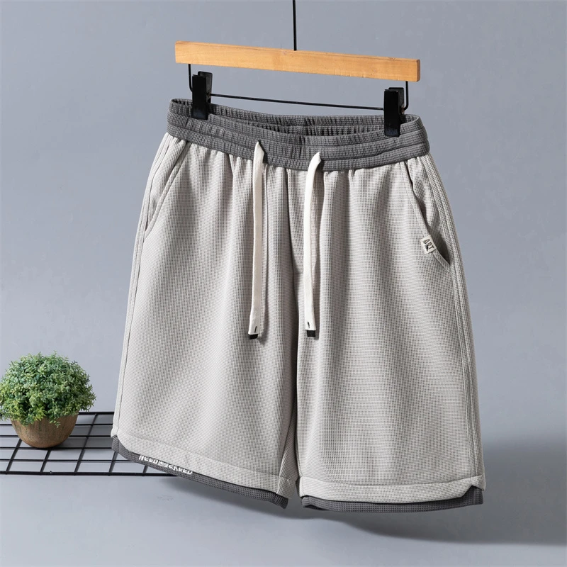 Ice silk shorts for men in summer, ultra-thin outerwear, quick drying basketball sports shorts, summer new casual five quarter p