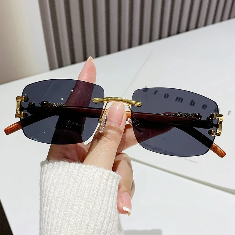 2023 New Fashion Rimless Cut Edge Sunglasses For Men And Women Personality Leopard Mirror Leg Sunglasses