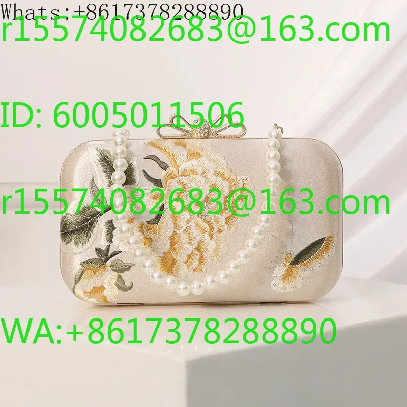 Embroidered Chinese style cheongsam with bag, evening dress, butterfly flower and flag in hand.