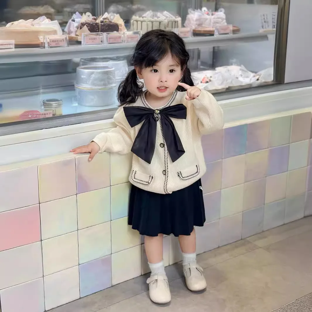 Girls' bow tie cardigan set, fashionable baby girl knitted top+pleated skirt, Korean version, Western style, Spring and Autumn