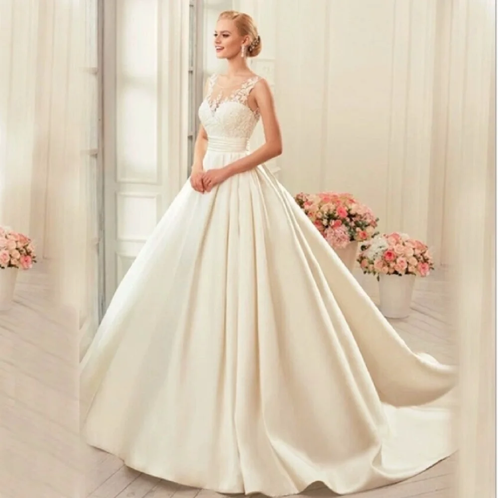 

ZJ4059 Sexy Modest Wedding Dresses O-Neck Bridal Gowns Lace Appliques Floor Length Robes Glamorous