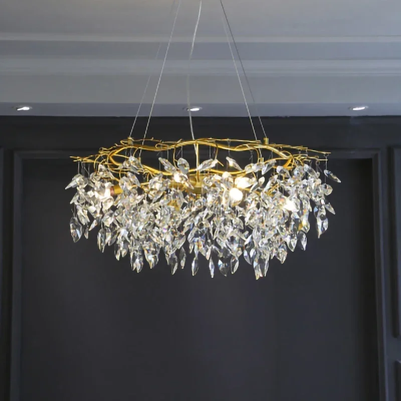 

French modern and elegant crystal chandelier for a luxurious and romantic restaurant with novel tree-shaped lamps