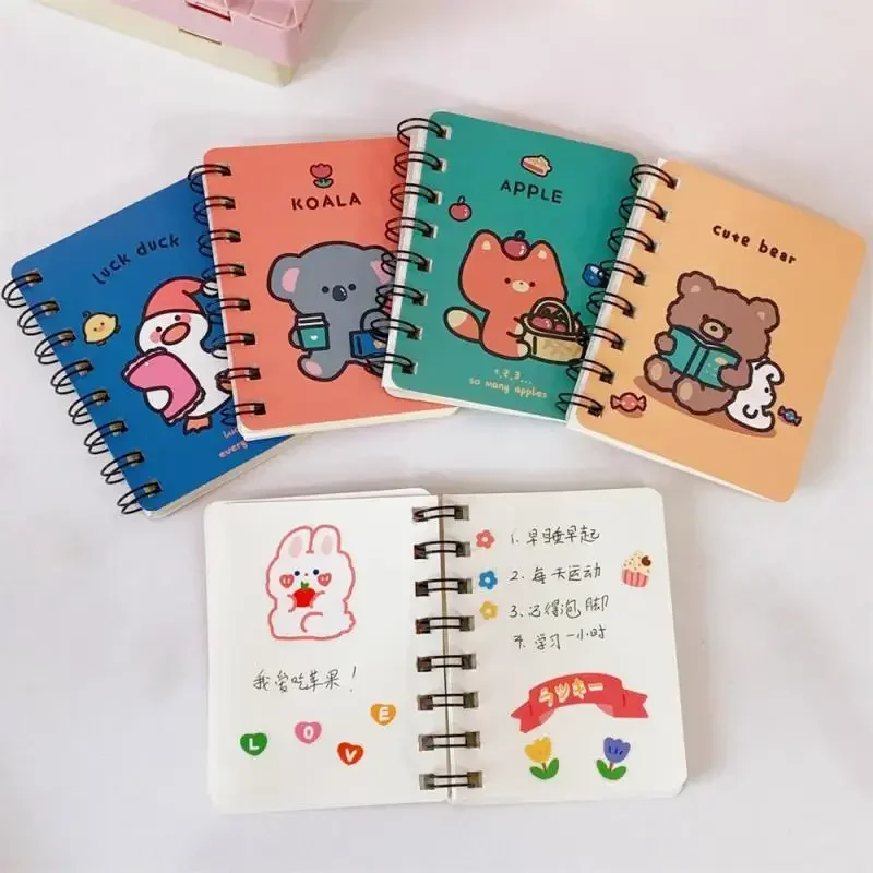 A7 ขนาดเล็กม้วนหนังสือโน้ตบุ๊คนักท่องเที่ยว Kawaii การ์ตูนนักเรียน Mini Blank Notebook Study Office Pocket Notepad