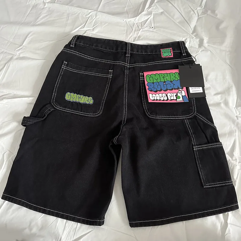 Black topstitched mid-length pants