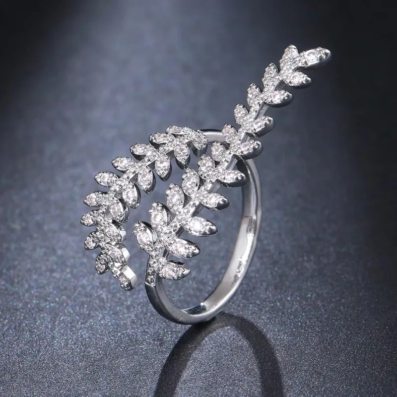 

Huajie Dazzling Bright Zirconia Dynamic Plant Rings for Women Elegant Leave Resizable Rings Party Fashion Jewelry