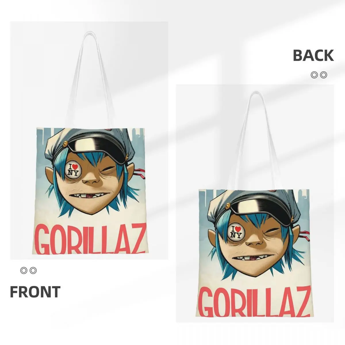 กระเป๋าช้อปปิ้งวงดนตรีกอริลาซ กระเป๋าผ้าแคนวาส กระเป๋าโท้ทแบบใช้ซ้ำได้สำหรับสาวๆ กระเป๋าสะพายไหล่ กระเป๋าเดินทาง