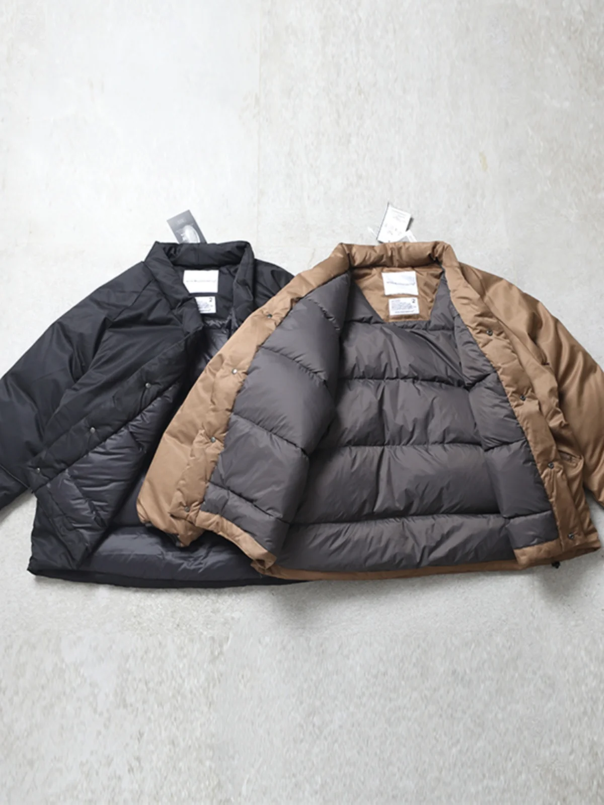 White Mountaineering × TAION Windproof matte silhouette down jacket