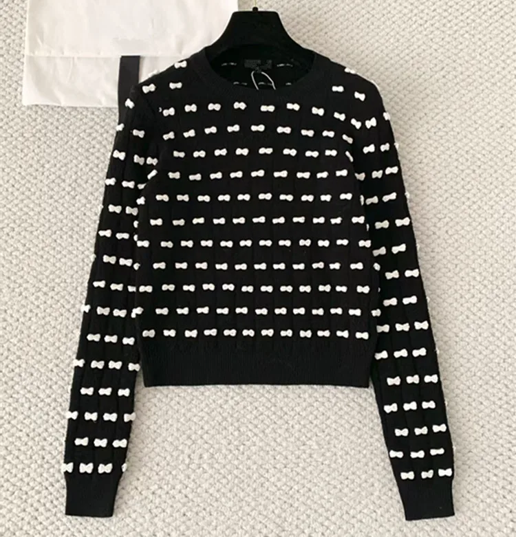

Customized European and American women's clothing for winter 2025 Long-sleeved black woolen knitted sweater with bow