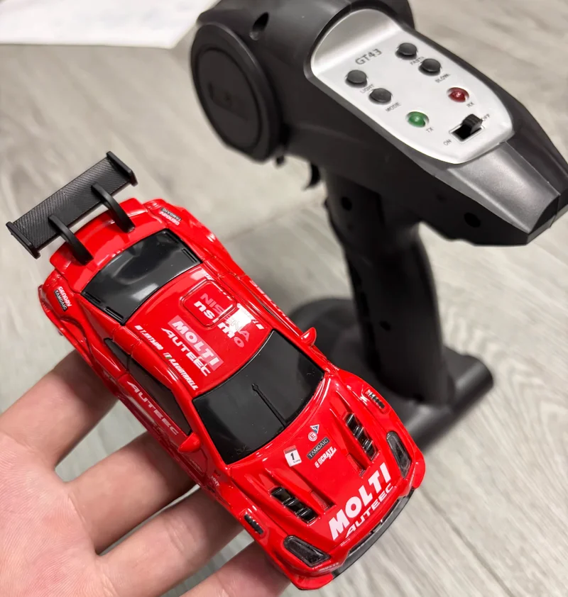 

New Hot 1:43 Alloy Four-Wheel High-Speed Drive Drift Car Desktop Series Full Scale Gyroscope Remote Control Toy Car Boys Gift