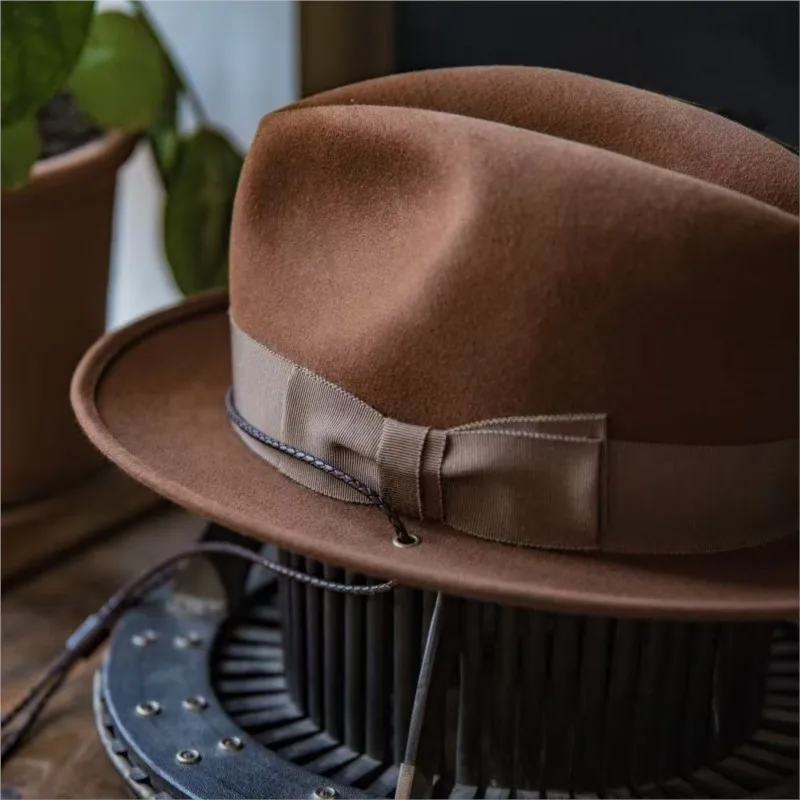 Fashionable hat with pure top knot decoration