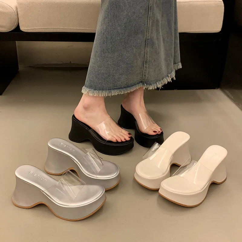 

2025 Hot Seller Summer New Thick Bottom One Word Transparent Strap Slippers with Slope Heels and High Heels for Womens Outerwear