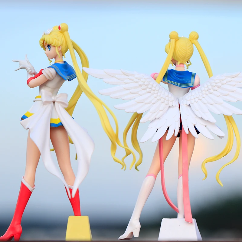 Neue Cartoon 23 cm Anime Sailor Moon Tsukino Action Figure Flügel Spielzeug Puppe Kuchen Dekoration PVC Modell Mädchen Geschenk Spielzeug für kind