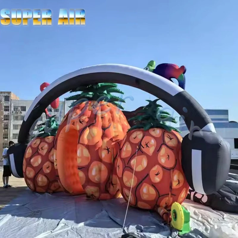 Arco di ananas gonfiabile per festival musicali all'aperto personalizzato alla moda per la decorazione scenica