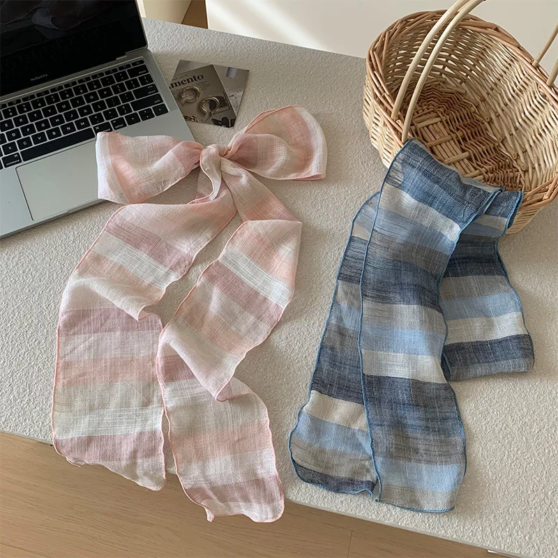 

INS-A long silk scarf with a high-end look, a fresh and retro style, and a unique neck-protecting striped headscarf