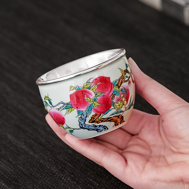 

Silver full silver 999 silver cup peach porcelain wrapped silver host cup double silver tea cup sample sample tea cup