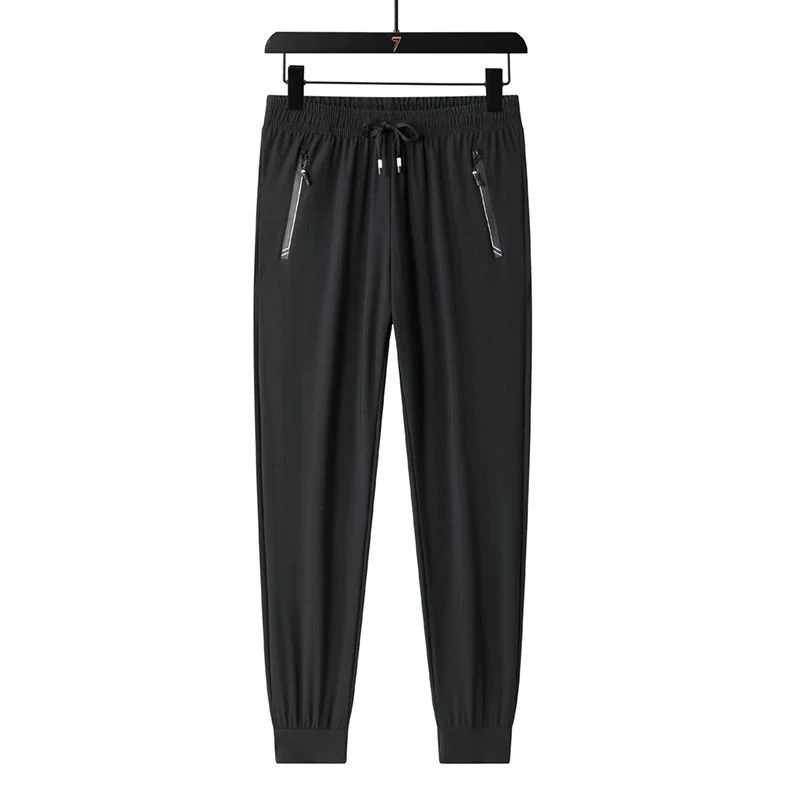 Wiosenne letnie męskie sznurowane spodnie dresowe Homme w pasie legginsy na wszystkie mecze sportowe spodnie męskie wygodne proste spodnie