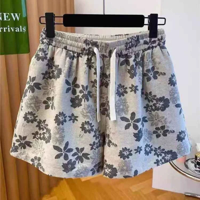 2025 Nuevos pantalones cortos de gama alta con estampado retro, modernos y versátiles para mujer