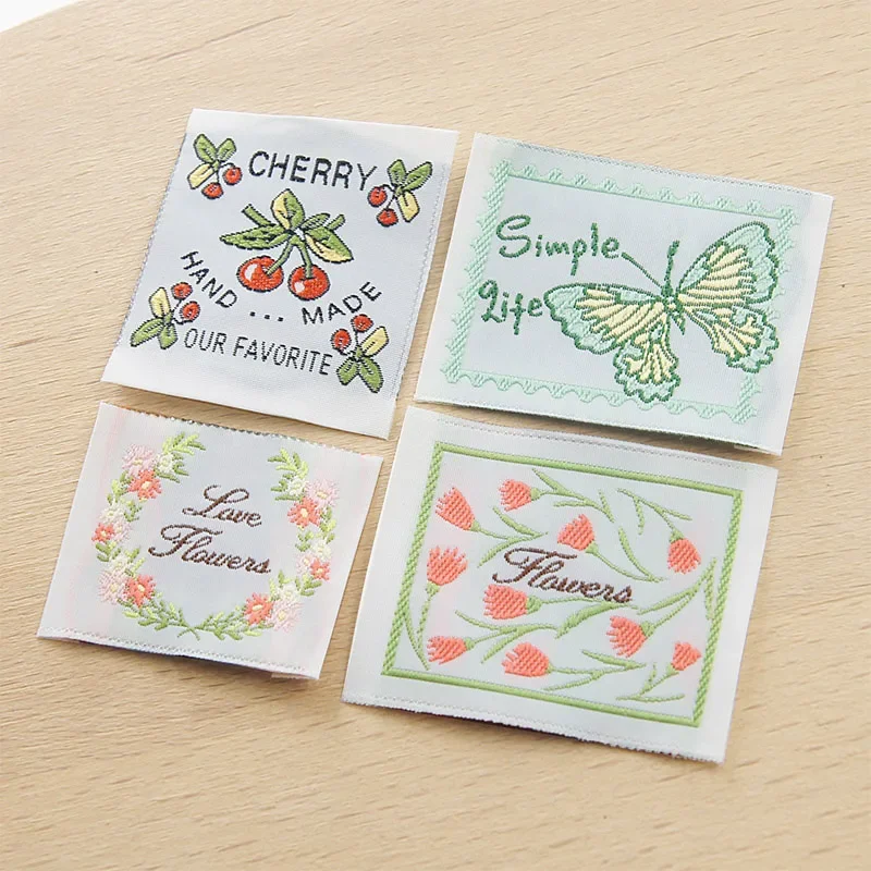 New stock colored handmade fabric label with intricate flower series,embroidered woven label, auxiliary materials, sewing  label