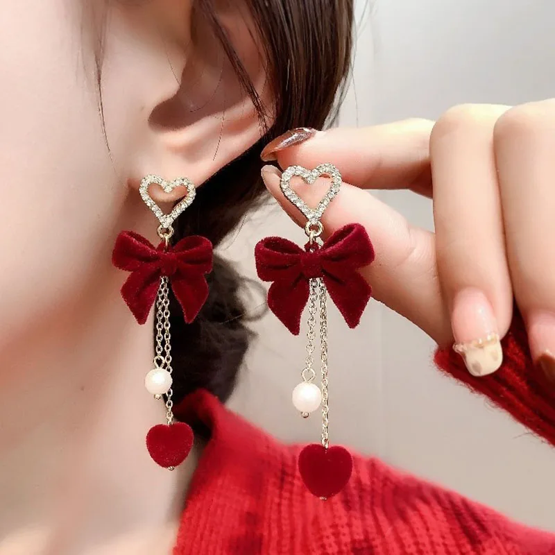 الأحمر توافدوا Bowknot ندفة الثلج ستار القلب الأقراط الطويلة عيد الميلاد الحلو الأزياء والمجوهرات النساء هدايا السنة الجديدة