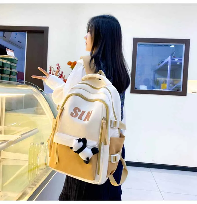 Tendencia Popular, compre uno y llévese otro gratis, colgante de Panda Oxford, bolsas de viaje versátiles de gran capacidad, mochila escolar ligera para mujeres y niñas