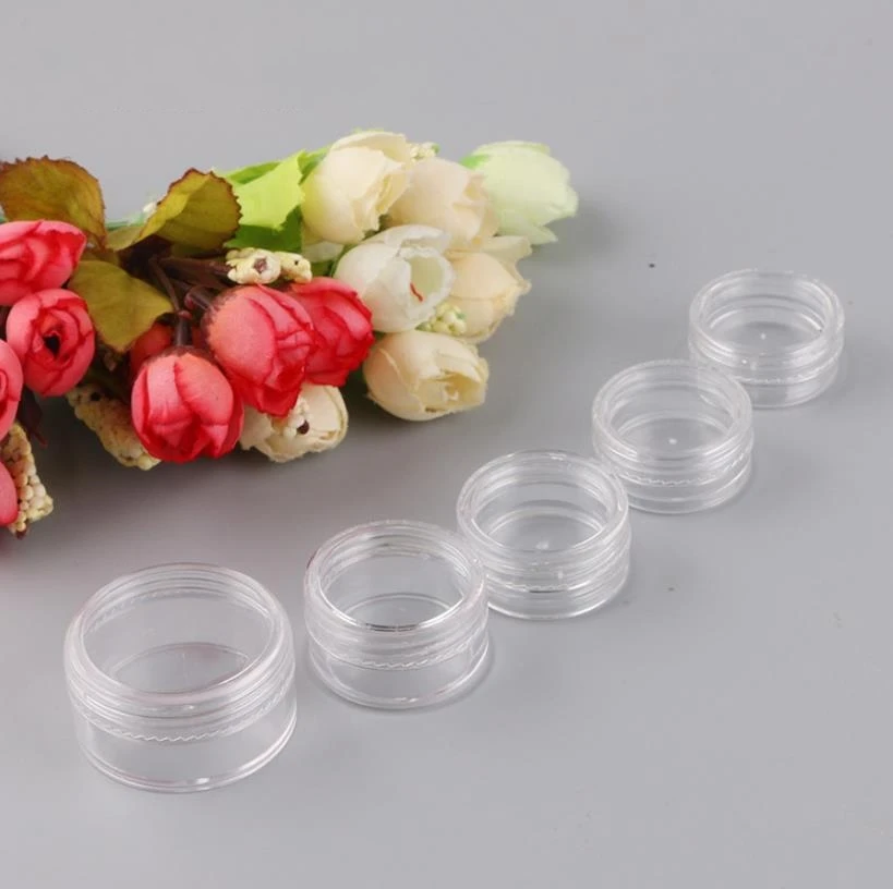 

Empty Clear Small Cosmetic Container Portable Facial Eye Cream Jar Cosmetic Glitter Powder Container with Flat White Black Lid