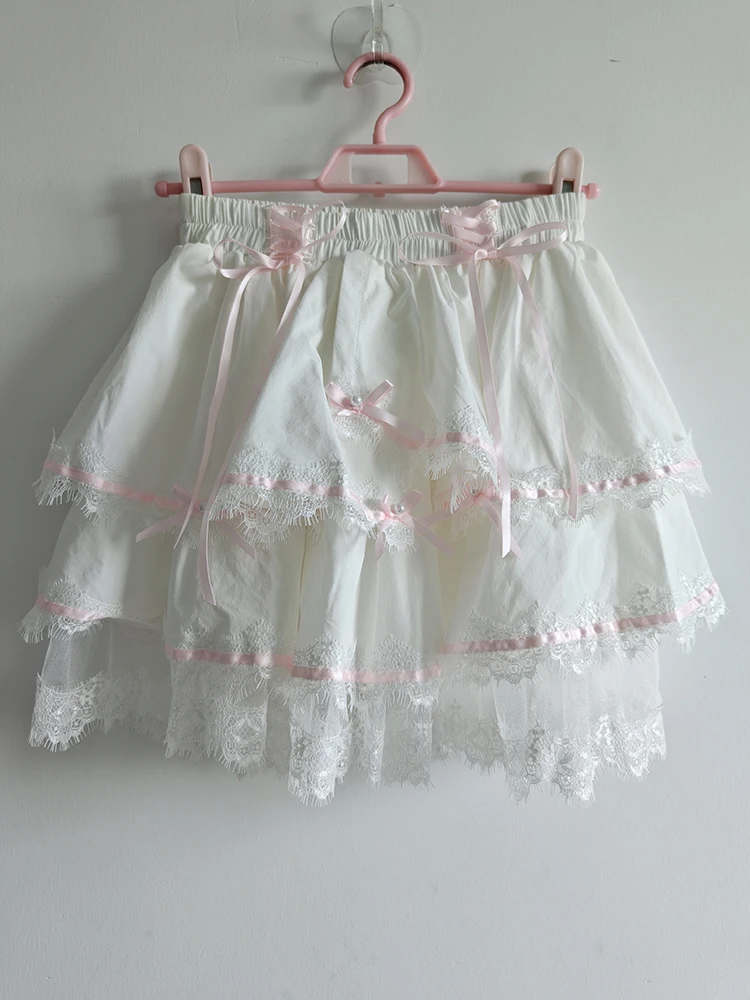 Mini jupes mignonnes pour filles douces, garniture en dentelle, décoration de nœud, taille élastique, short de style Lolita, vêtements Kawaii, été