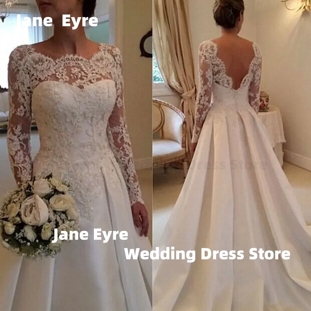 ジェーン・エア エレガントなバックレスウェディングドレス ヴィンテージ風ローブ・ド・マリエ レースサテンロングスリーブブライダルドレス カスタムメイド ローブ・ド・マリエ