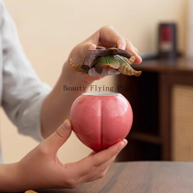 

1pc Chinese Style Ceramic Peach Tea Jar Shoutao Sealed Jar Fruit Shape Household Ceramic Sealed Container Tea Room Supplies