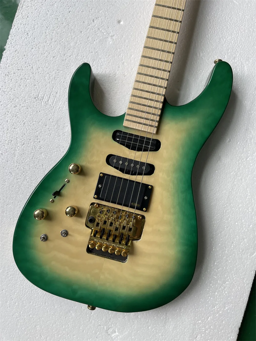 Left Handed Green Body Electric Guitar with Gold Hardware,Maple Neck,Provide Customized Services