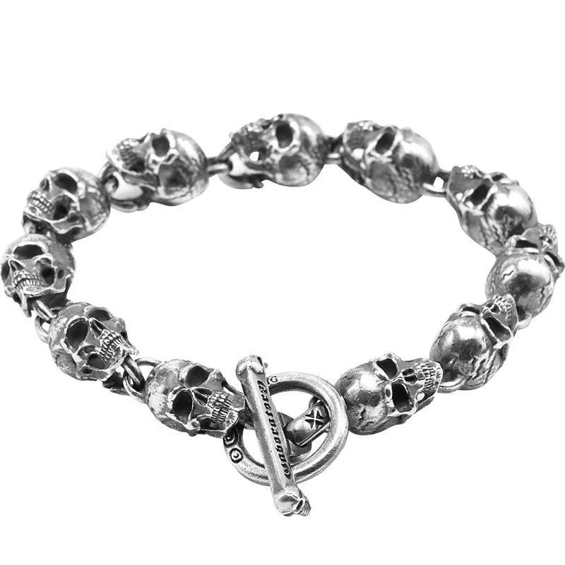 

Heavy Metal Skull Link Bracelet – Gothic Punk Rock Jewelry with Bone Clasp Design
