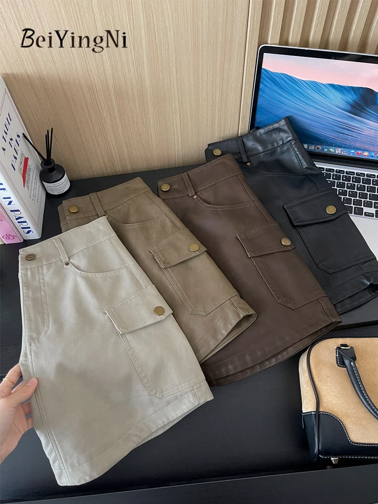 Beiyingni Amerikanischen Stil PU Leder Mini Rock Frauen Vintage Harajuku Hohe Taille A-line Cargo Röcke Damen Casual Straße Faldas