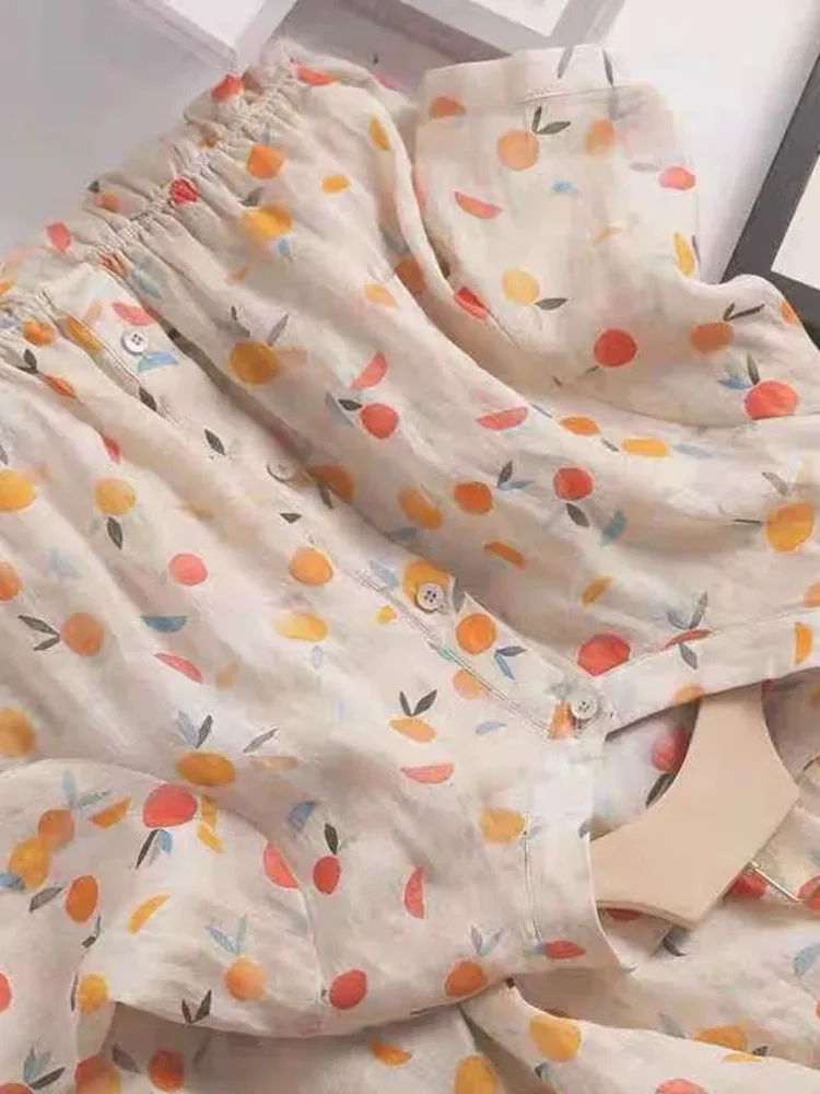 Letnia, kwiatowa spódnica midi z lnu i bawełny, wyszczuplająca, codzienna, dla drobnych sylwetek, słodka i swobodna.