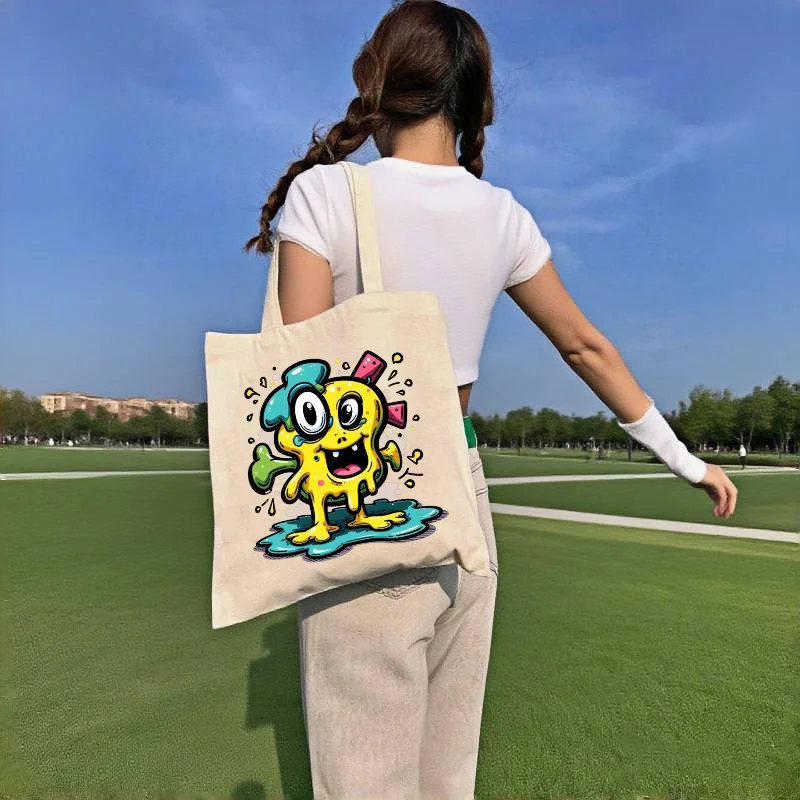 1pc Cute Happy Melting Monster Graphic Canvas Tote Bag Double Sided Print Colorful Pop Art Large Capacity Daily Shoulder Bag