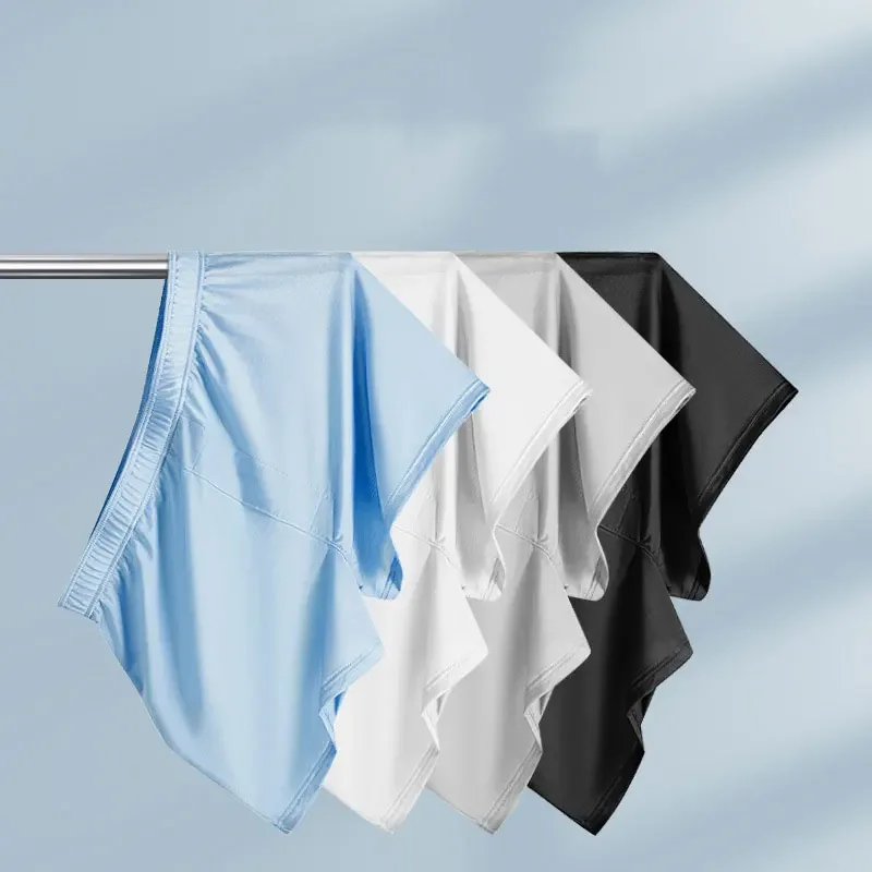 Bóxer de seda de hielo sin costuras para hombre, pantalones cortos de Color sólido, bragas delgadas, ropa de dormir cómoda, ropa interior de verano,