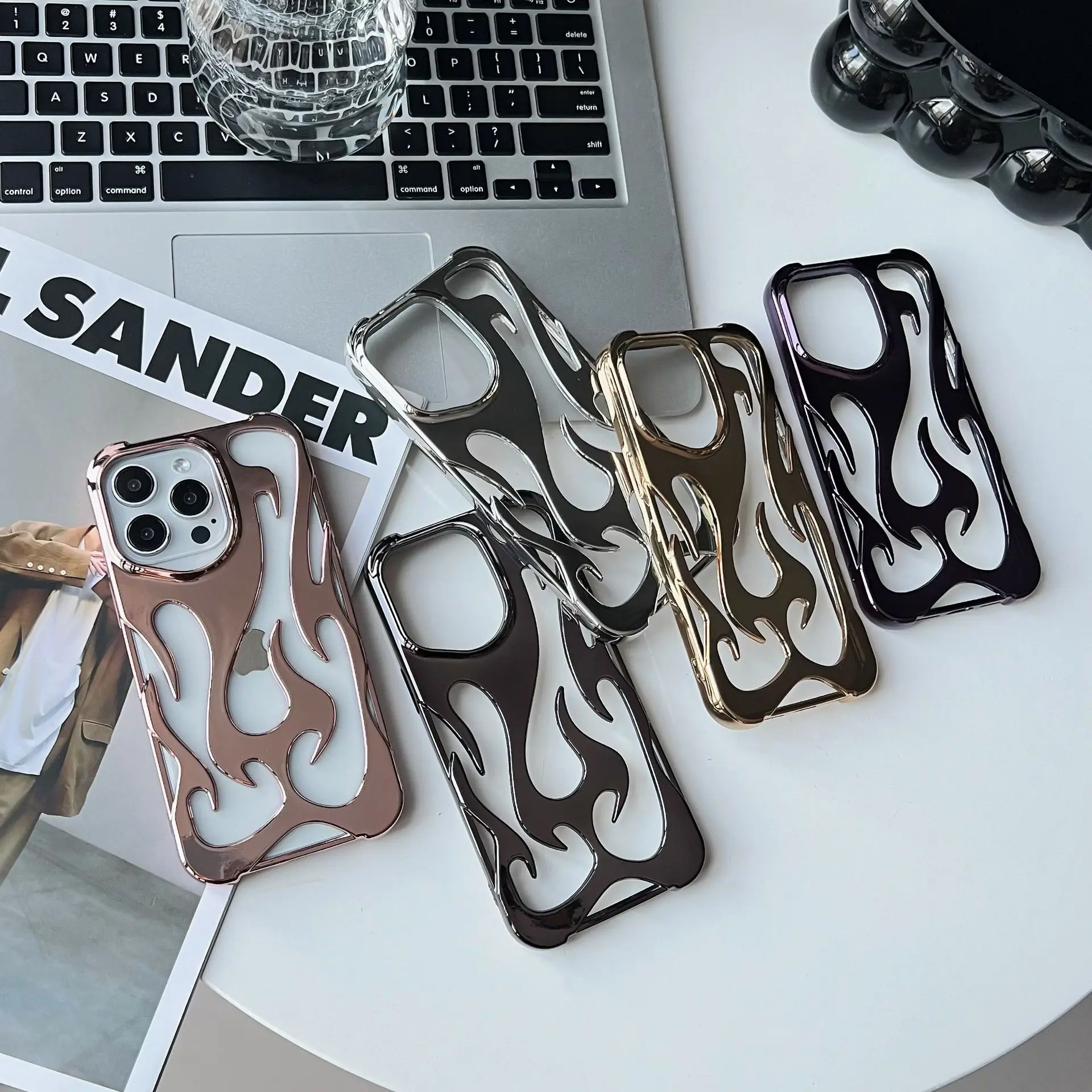 Electroplated hollow flame pattern shell suitable for iPhone 16Pro heat dissipation case, four corner anti drop protective cover