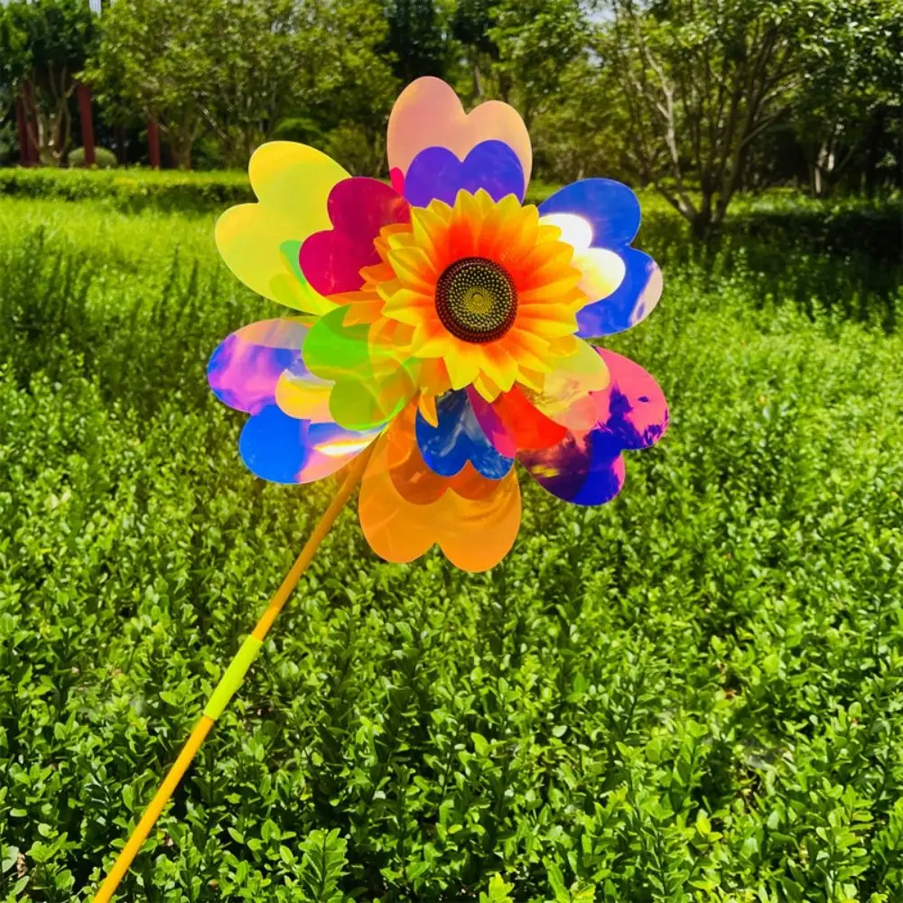 กังหันลมดอกทานตะวันหลากสไตล์ เปลี่ยนสีได้ ขนาด 32 ซม. หมุนได้ ทำจากพีวีซีสองชั้น เลเซอร์ระยิบระยับ