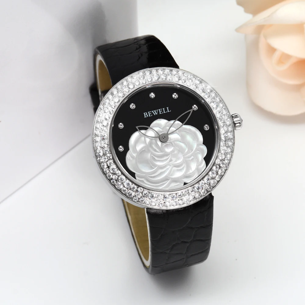 Reloj de mujer de cuarzo de acero inoxidable a la moda con correa de cuero con incrustaciones de diamantes y esfera de flores