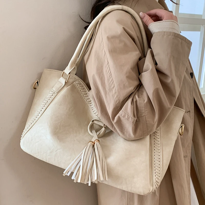 أنيقة المرأة شرابة حقائب كتف واحدة الكورية الرجعية VersatilePU حقائب عادية سعة كبيرة حقيبة تسوق سفر 2026 الاتجاه الجديد