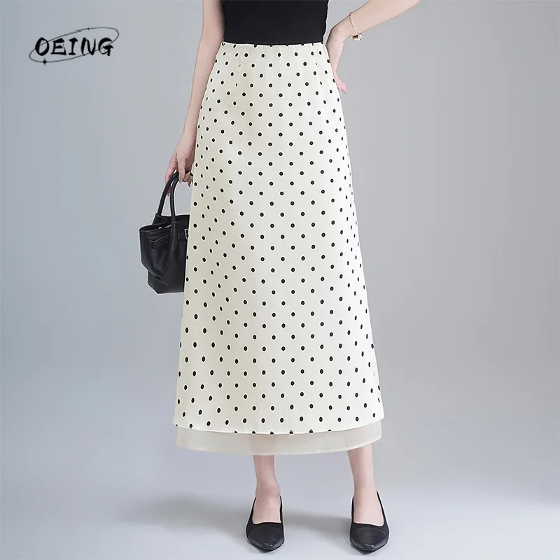 

Женская летняя элегантная приталенная юбка миди с высокой талией, разрезом и облегающим силуэтом, в горошек, модель 7556