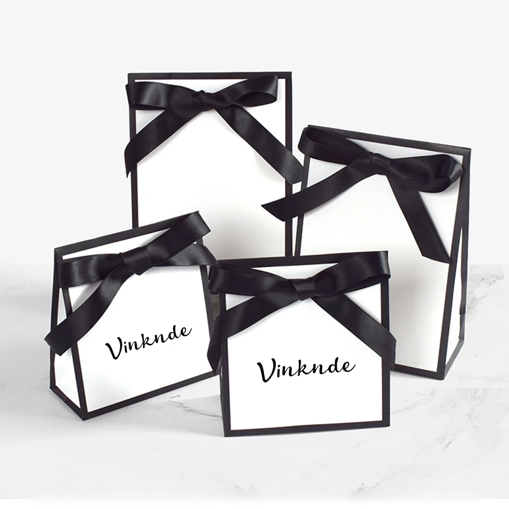 Custom Logo Black/White Cardboard Paper Shopping Bag with Bow Portable Handbag Gift Packing Tote with Handles for Storage Gifts