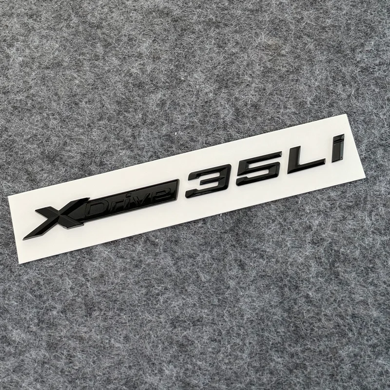 Etiqueta engomada del insignia del maletero del guardabarros del coche para BMW X1 X2 X3 X4 X5 X6 X7 Xdrive 20LI 25LI 28LI 30LI 35LI 40LI 45LI 50 accesorios del logotipo del emblema