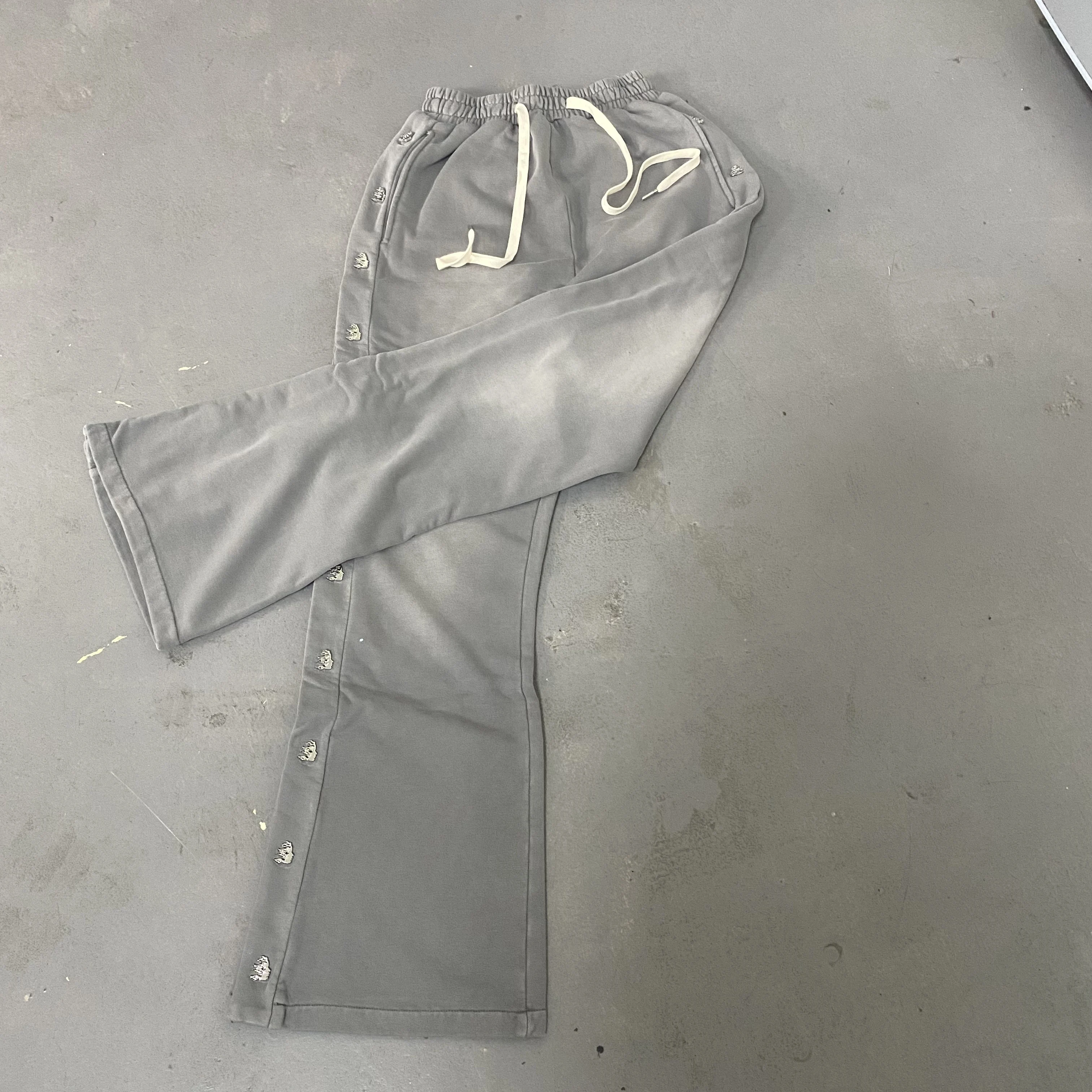 Pantalones deportivos de algodón puro de pierna ancha informales con botones de alta calidad