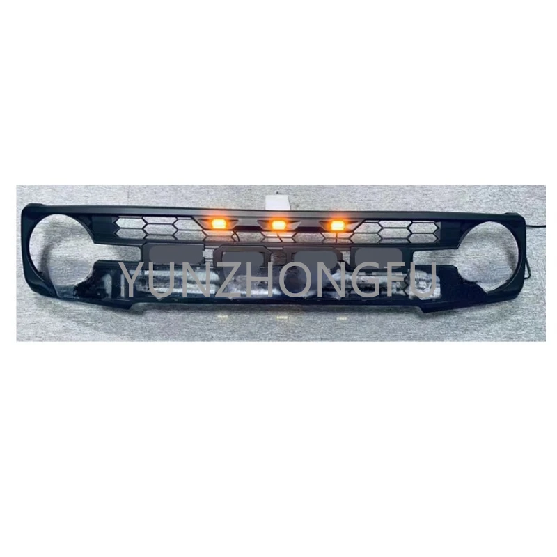 

Modification of the front grille with lights and accessories