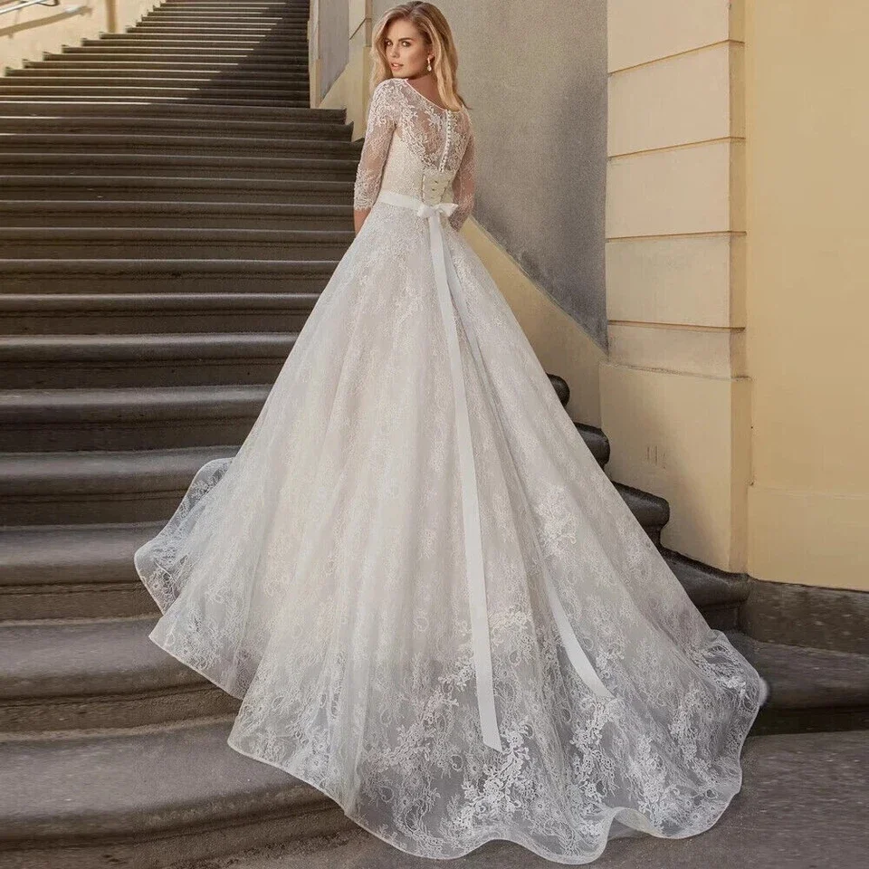 Abiti da sposa eleganti in pizzo a trapezio con scollo a O e maniche lunghe con applicazioni Abito da sposa avorio personalizzato
