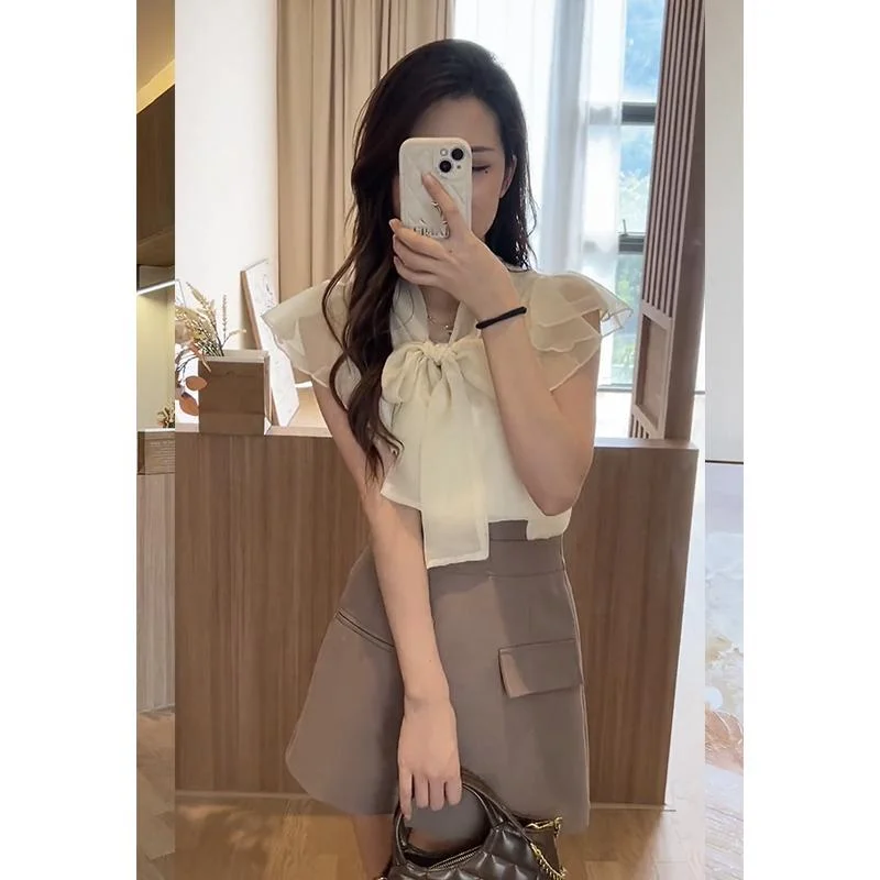 Chemise à manches courtes pour femmes, élégante, assortie avec tout, col en v, mode, couleur unie, laçage de tempérament, nœud, haut populaire, nouvelle collection été